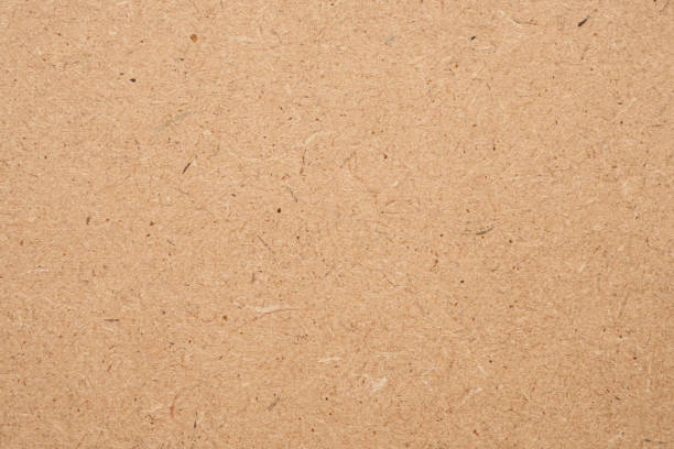 istock Old brown recycled eco paper texture cardboard background 1180106444