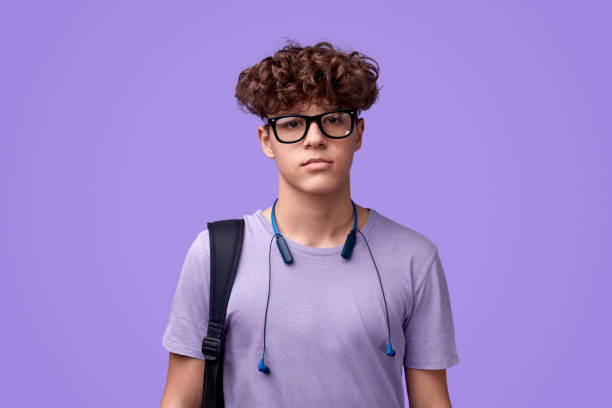 Teen student looking seriously at camera