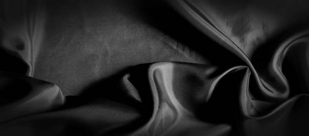 istock texture, background, pattern. Black silk fabric. It is black and heat resistant with gray. Transform its tougher drape into a design for any event. It is a crispy, lightly textured hand. 1180106724