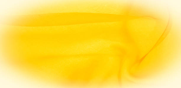istock Texture of yellow silk fabric. It is also perfect for your design, clothes, posters. Be creative with beautiful project accents. This fabric is inspired by your inspiration. 1180106799