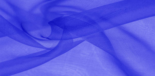 istock Texture of blue silk fabric. It is also perfect for your design, clothes, posters. Be creative with beautiful project accents. This fabric is inspired by your inspiration. 1180106804