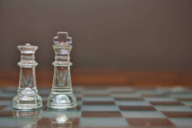 istock King and Queen pieces on a chess board 1180108077