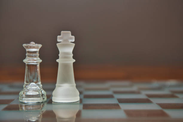 istock King and Queen pieces on a chess board 1180108132