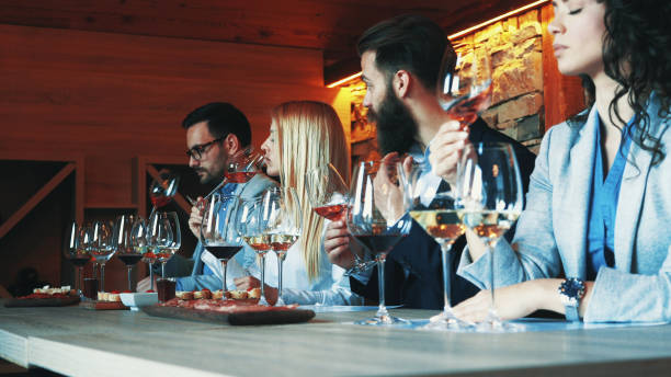 istock Friends tasting wine together 1180112264