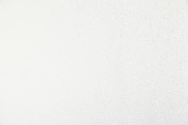 istock White paper with rough surface texture background. Looks like white plastered wall. 1180112802