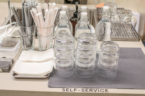 istock Cups for coffee free drinking water self service for customer in cafe and restaurant Syrup coffee station in coffee shop 1180120066