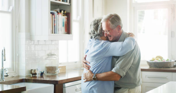 istock When you hug me, I'm instantly home 1180121939