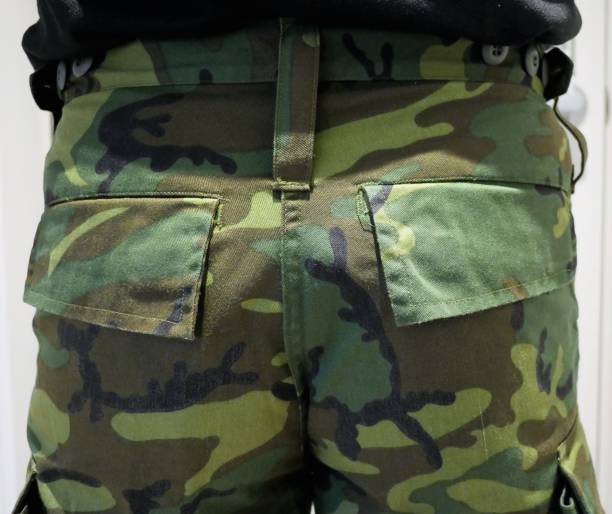 istock Green camouflage military army pants 1180121970