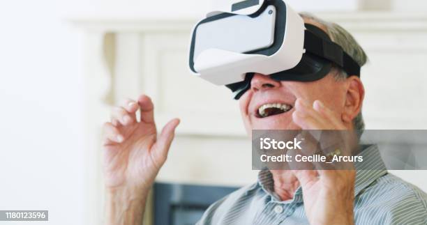 Its The Stuff You Find In Your Fantasies Stock Photo - Download Image Now - Virtual Reality Simulator, Virtual Reality, Senior Adult
