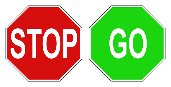 A Green Go and Red Stop sign isolated on white with clipping path