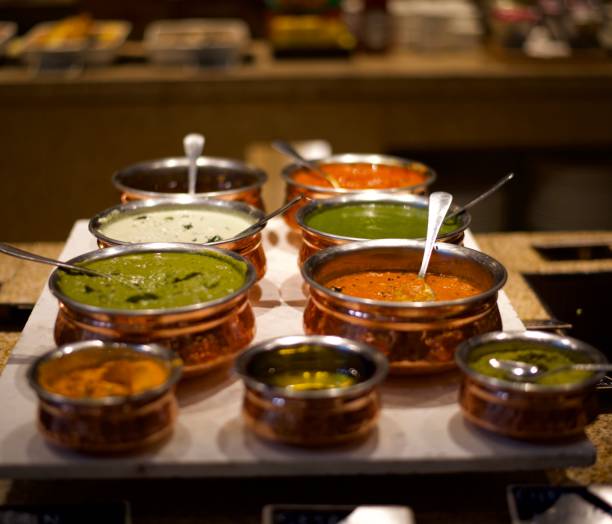 istock Assorted Indian Chutneys in copper bowls 1180131612