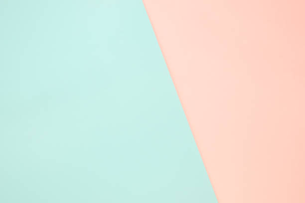 istock Light green and orange pastel paper color for background 1180136764