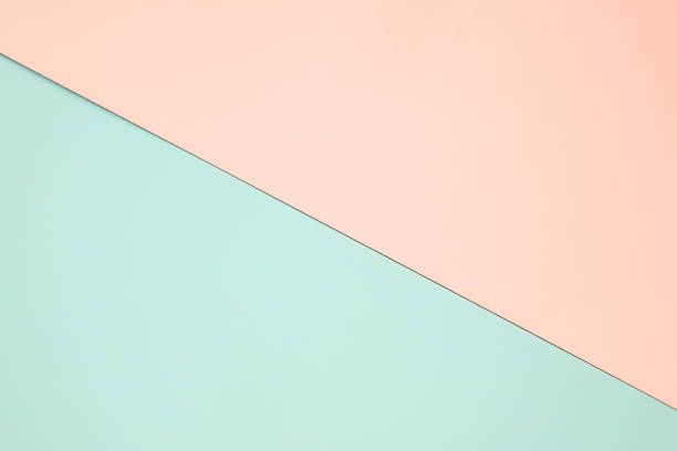 istock Light green and orange pastel paper color for background 1180136767