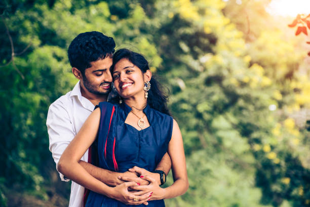istock Happy Young Indian couple hugging 1180138674