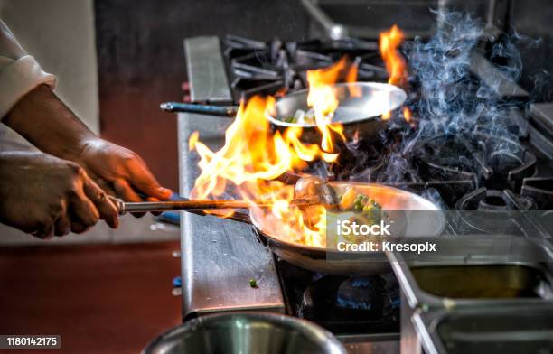 Flambe Flame Food Frying Pan Stock Photo - Download Image Now - Chef, Restaurant, Cooking