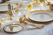 Close up detail of a dining table set up for Christmas.