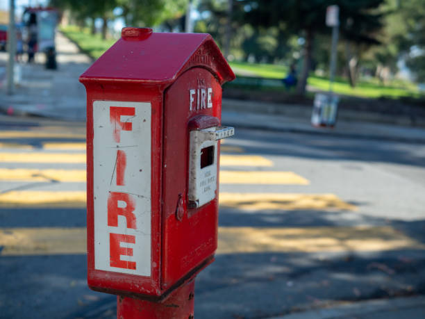 istock Outdoor fire alarm call box at urban intersection 1180145933