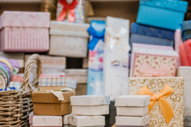 istock Many gift boxes in hobby shop. Presents gift box. Collection in vintage, rustic, diy style. 1180146064