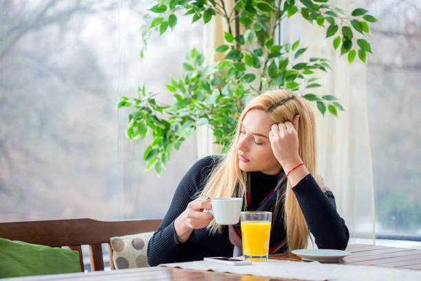 istock Woman using her Mobile Phone 1180149192