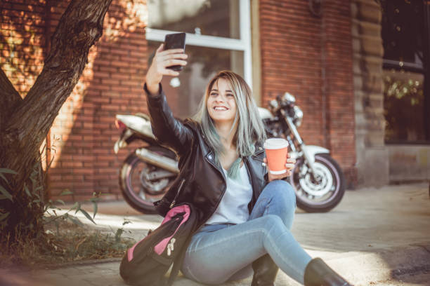 istock Female motorcyclist 1180149268