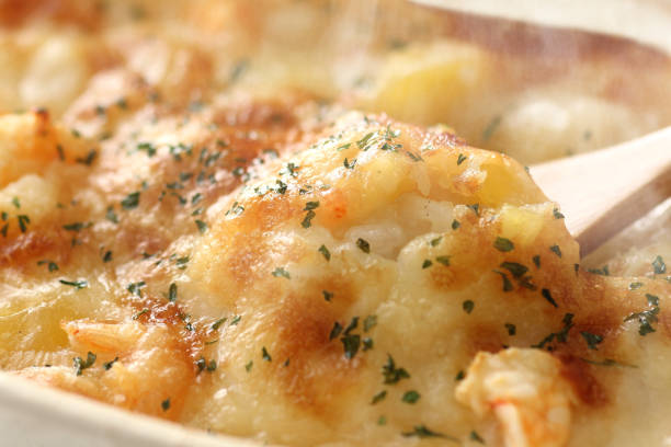 Gratin up Gratin, steam, oysters, shrimp, scallops, truffles. seafood gratin stock pictures, royalty-free photos & images