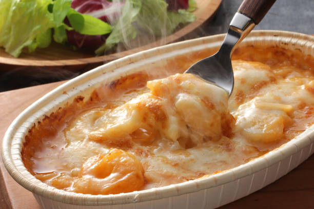 Gratin up Gratin, steam, oysters, shrimp, scallops, truffles. seafood gratin stock pictures, royalty-free photos & images