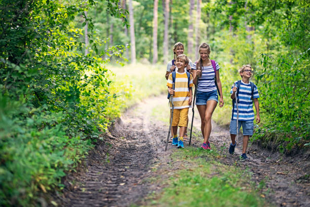 istock Family enjoying hiking together 1180153703
