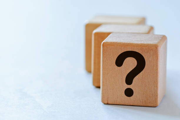 istock Question mark on small wooden dices 1180155550