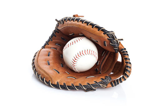 New Baseball in a Glove in the Outfield