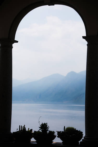 istock Arcade from a villa with lake view 1180157118