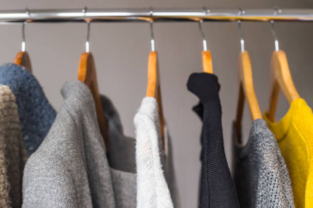 istock Warm feminine things for autumn and winter in dark basic colors with yellow 1180159513