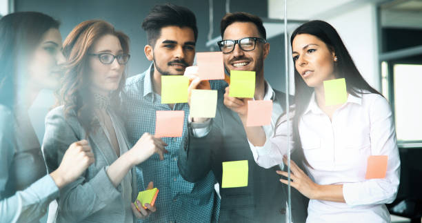 istock Creative business people working on business project in office 1180164821