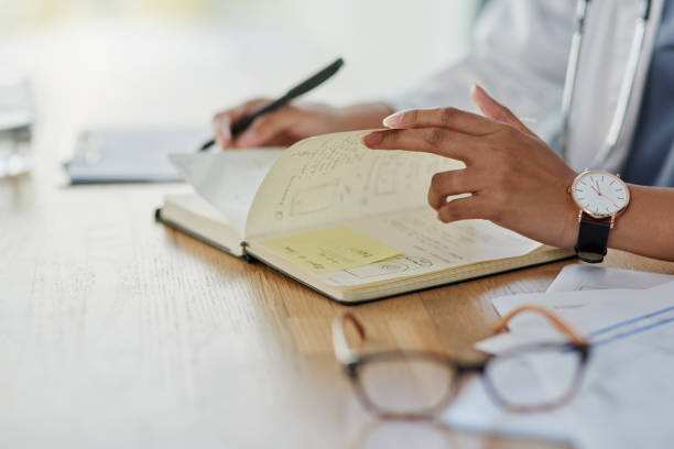 istock Keeping notes on the progress of her patients 1180165781