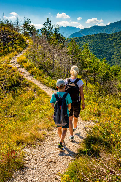 istock mother and son hiking 1180166340