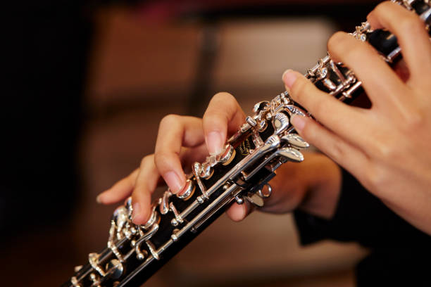 Playing the oboe stock photo