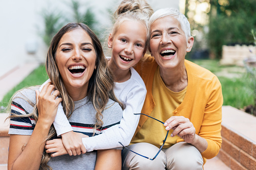 Three Generation women - portrait of young mother, grandmother and girl