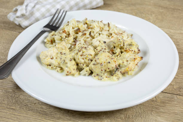 istock pork with mustard and rice 1180167906
