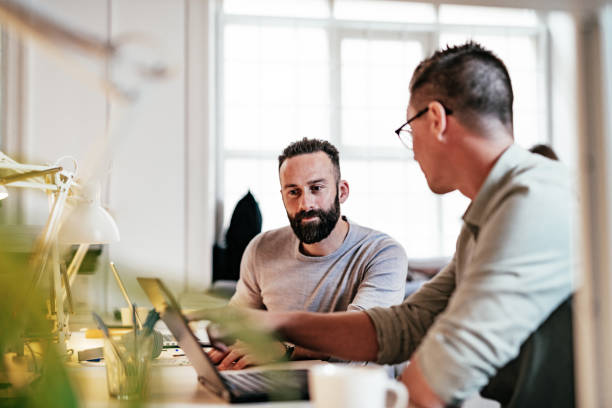 istock Colleagues discussing new investment plan for the start-up 1180170973