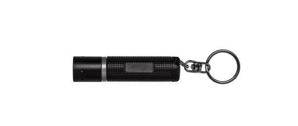 moderna torcia in metallo nero isolata su sfondo bianco - tactical flashlight foto e immagini stock