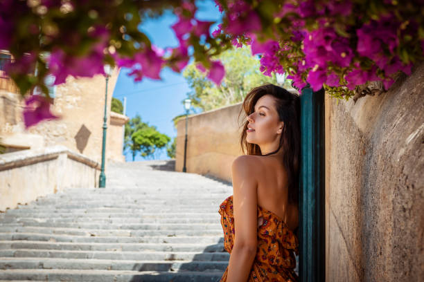 istock brunette woman on vacation on majorca 1180178479