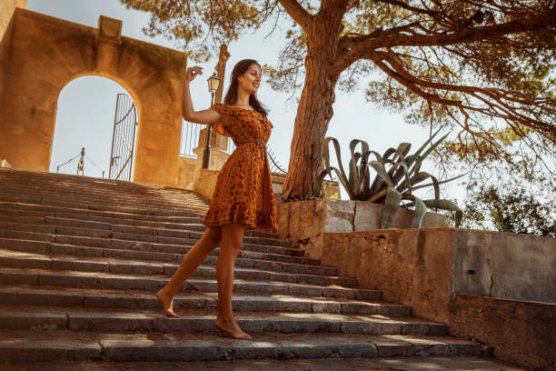 istock brunette woman on vacation on majorca 1180178518
