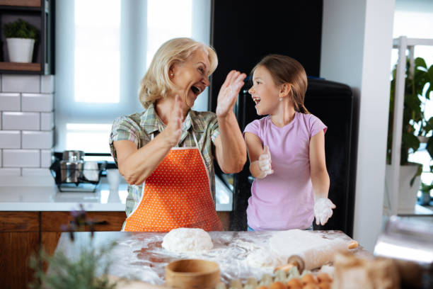 istock Making cookies with grandma 1180181284