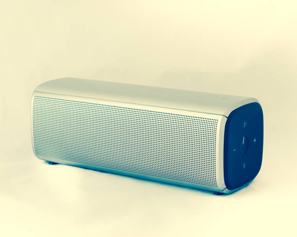 istock Filtered image studio shot of grey bluetooth speaker isolated on white 1180182962