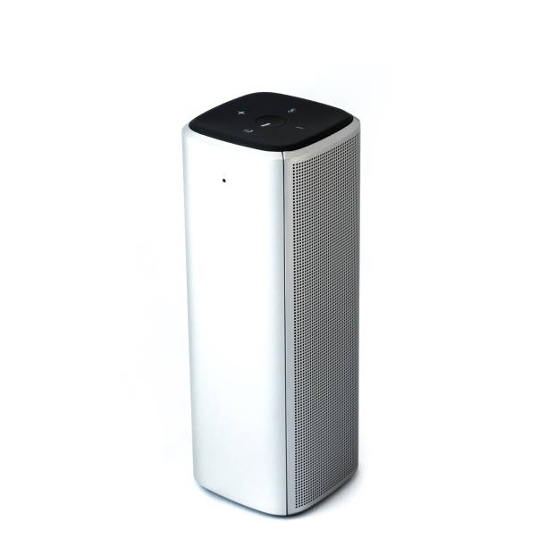 istock Studio shot of grey bluetooth speaker isolated on white 1180182973