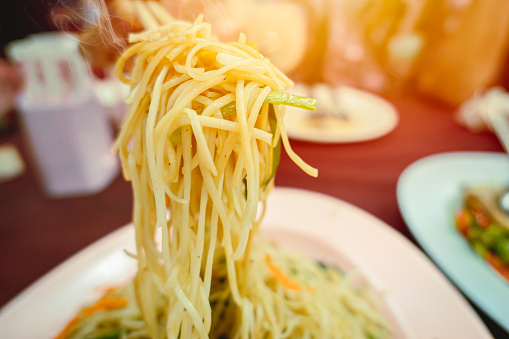 Chow Mein Chinese stir fry yellow noodle food closeup