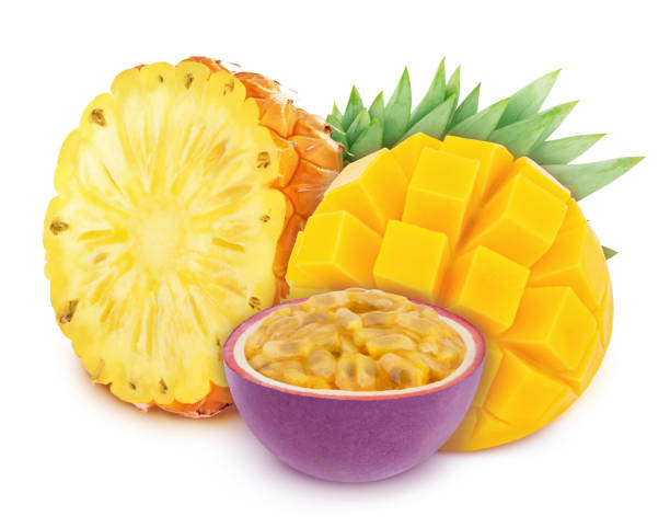 istock Multicolored composition with assortment of cutted fruits - pineapple, mango and passion fruit, isolated on a white background with clipping path. 1180186051