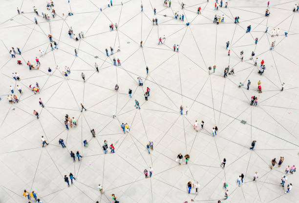 Aerial view of crowd connected by lines Aerial view of crowd connected by lines geographical locations stock pictures, royalty-free photos & images