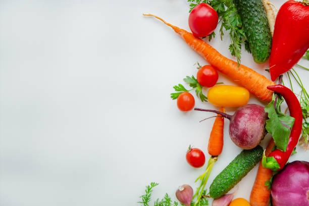 istock Composition with raw vegetables on a white background. Frame of vegetables. 1180187819