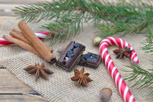 istock candy canes chocolate and spices on a table  in christmas decoration 1180188990