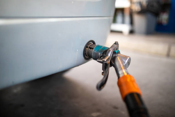 Refueling a car with LPG gas Close up of Refueling a car with LPG gas liquefied petroleum gas photos stock pictures, royalty-free photos & images